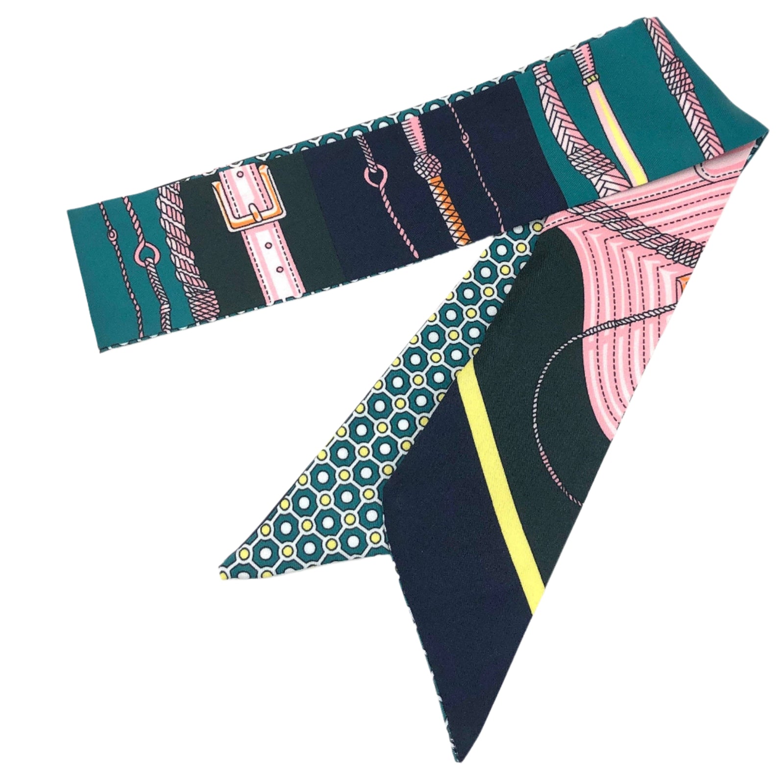 Colorful patterned fabric strip on a white background