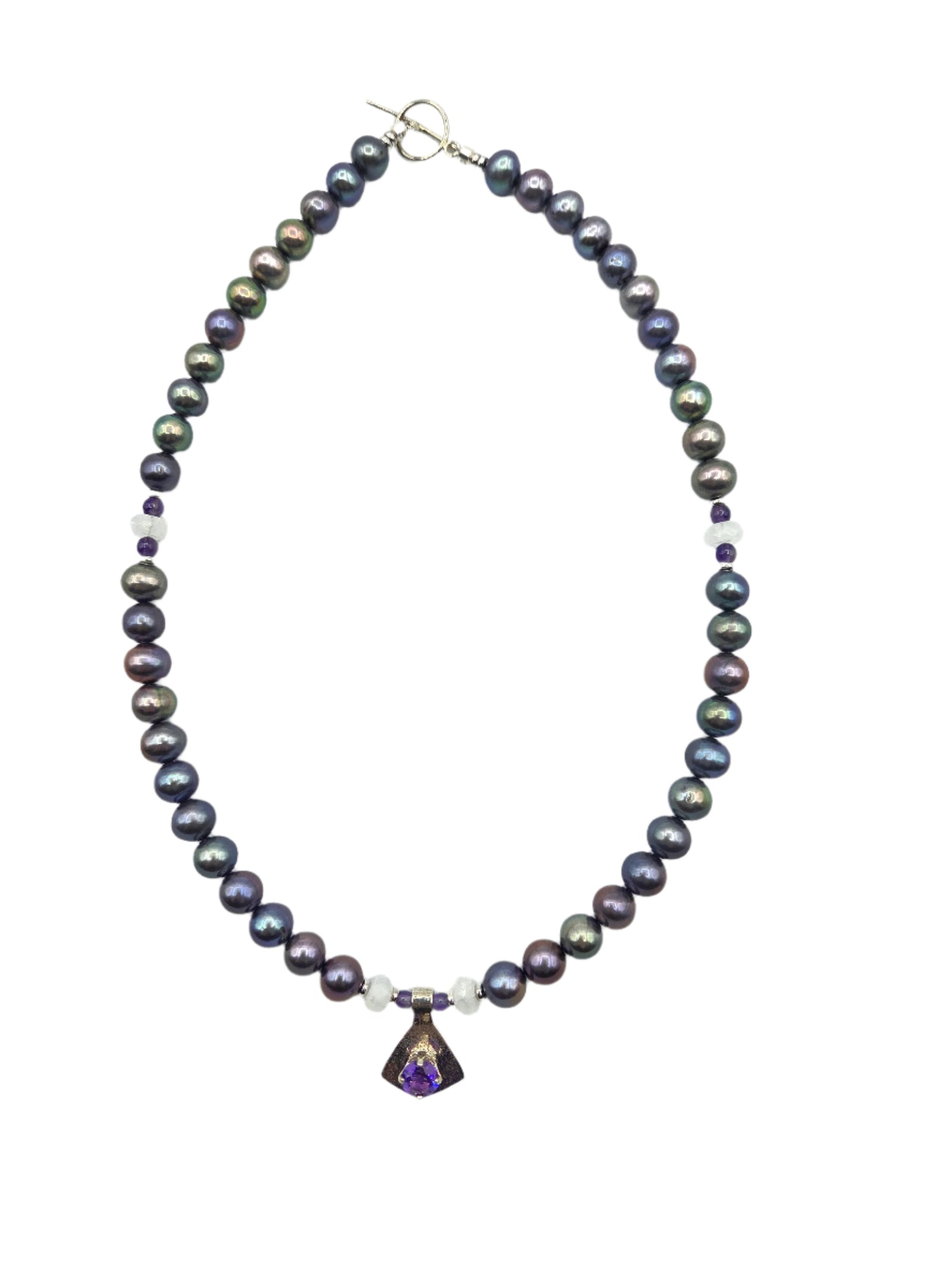 Necklace with purple and black pearls on a white background