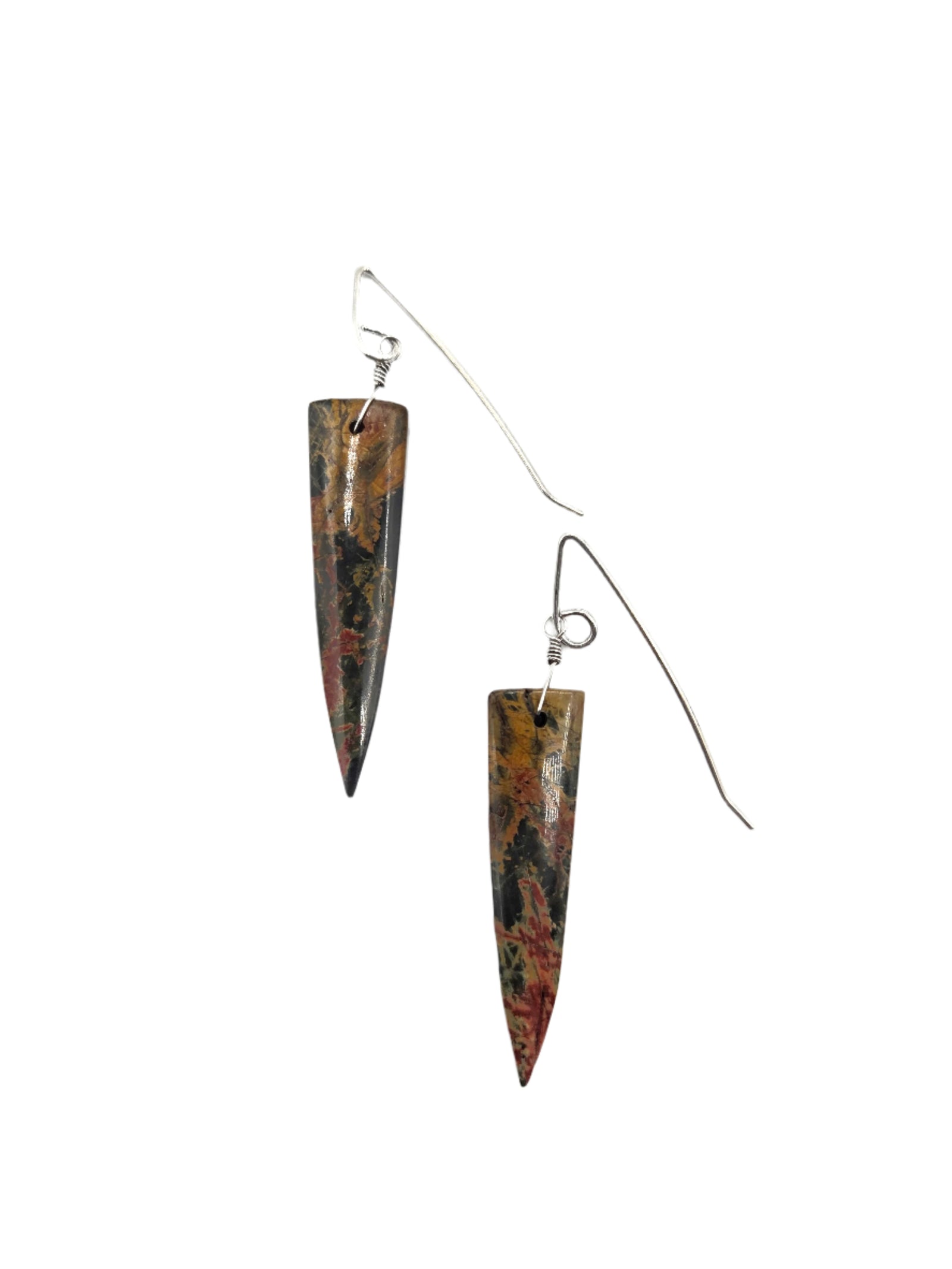 Tapered earrings with brown and black pattern on a white background