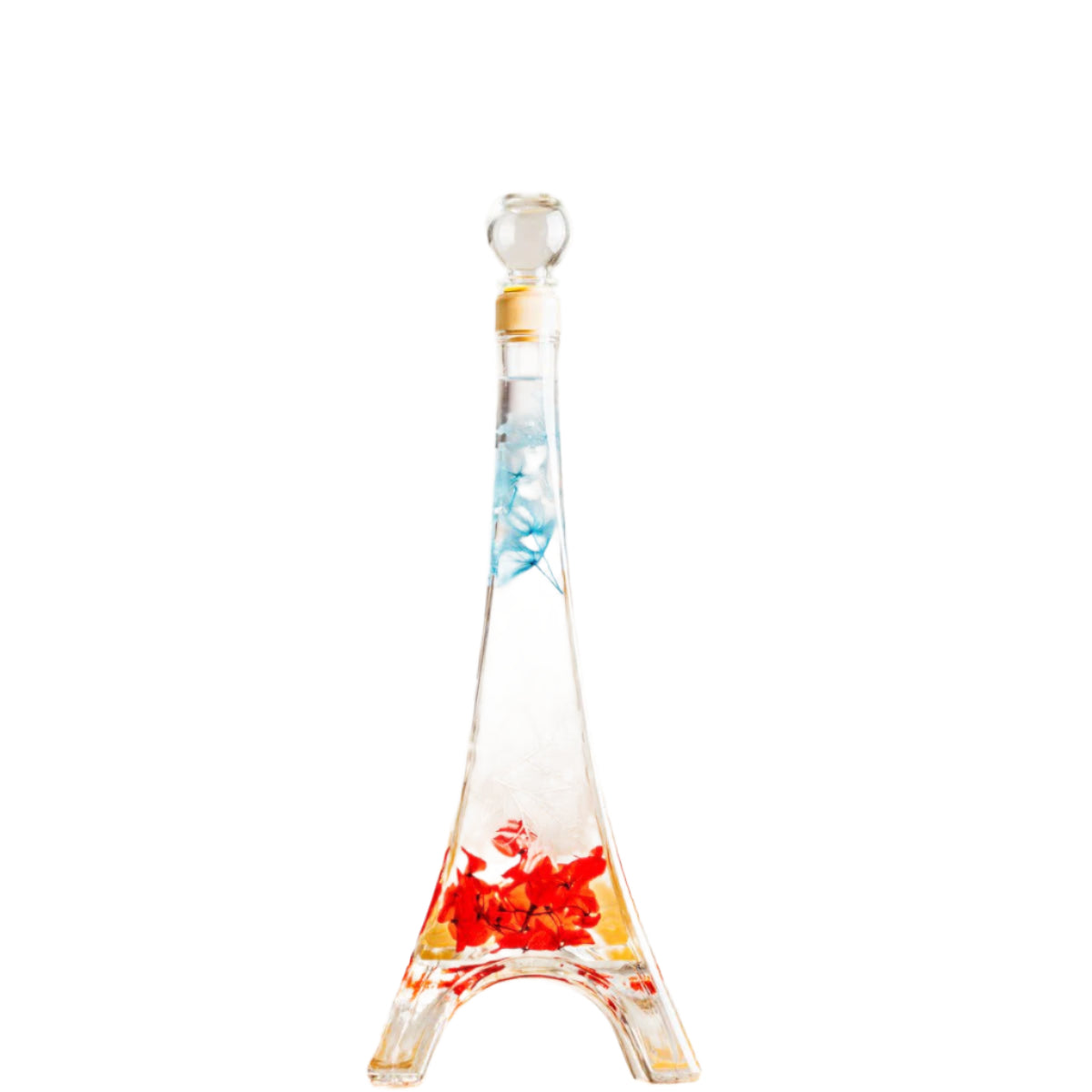 Decorative glass bottle in the shape of the Eiffel tower with blue, white and red floral design