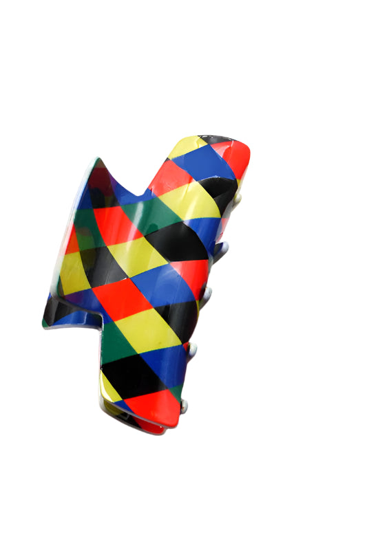 Colorful geometric-patterned hair clip on a white background