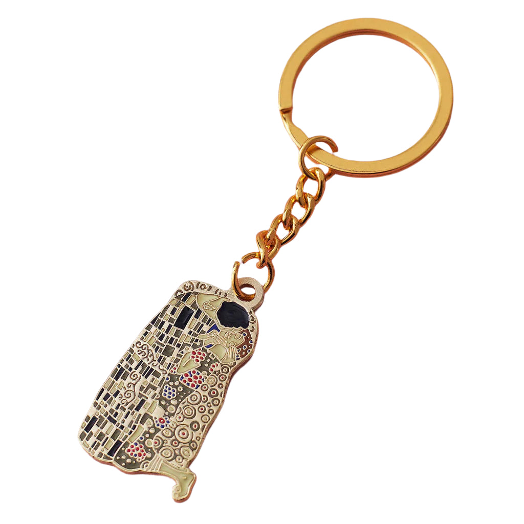 Keychain of two abstract people kissing on a white background