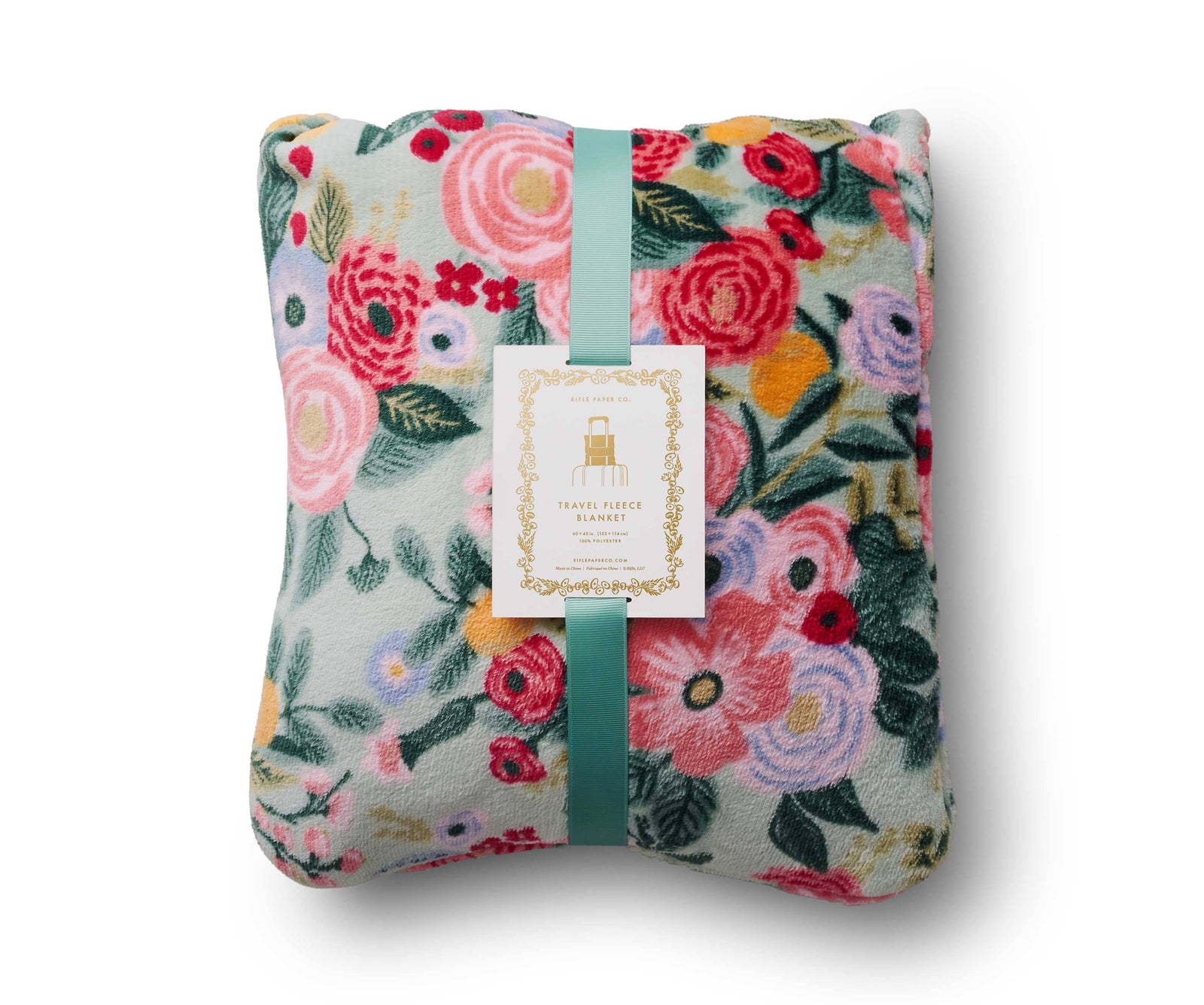 Floral-patterned (pink, red, purple, blue, and green) blanket with a tag on a white background