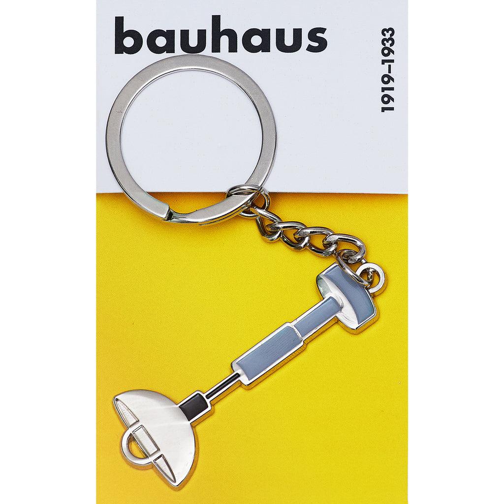 Keychain with a design inspired by Bauhaus on a yellow background