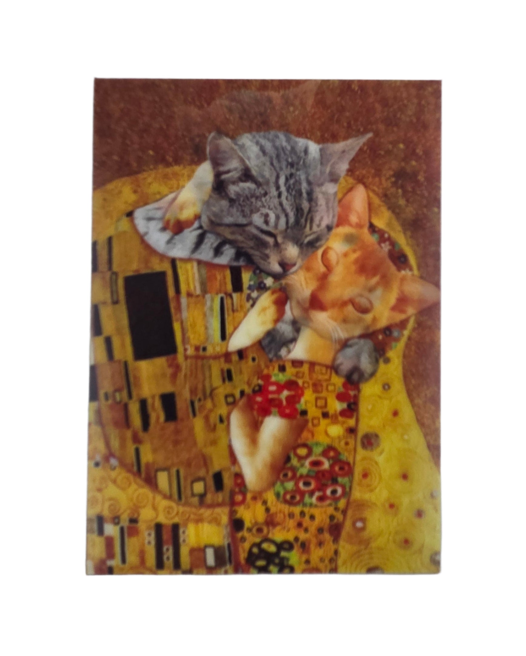 Two cats on a surface with a design resembling 'The Kiss' by Gustav Klimt.