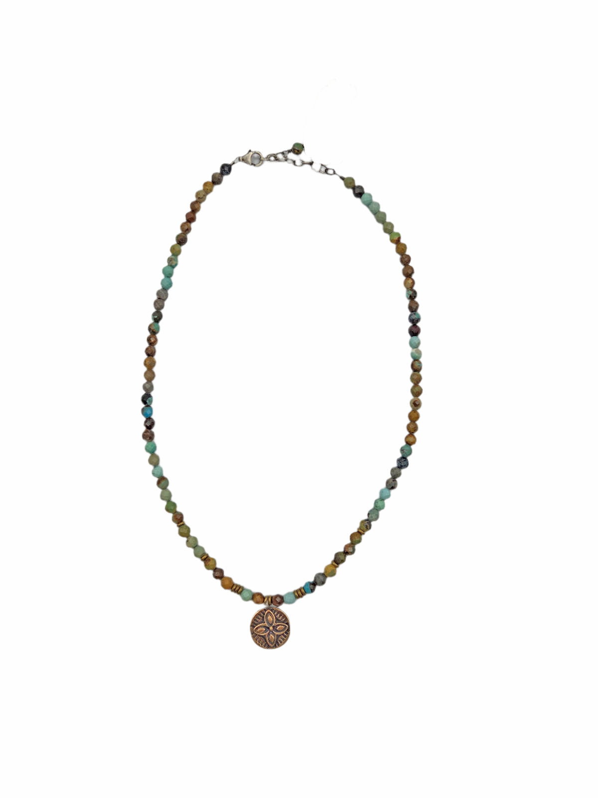 Beaded necklace with a circular pendant on a white background