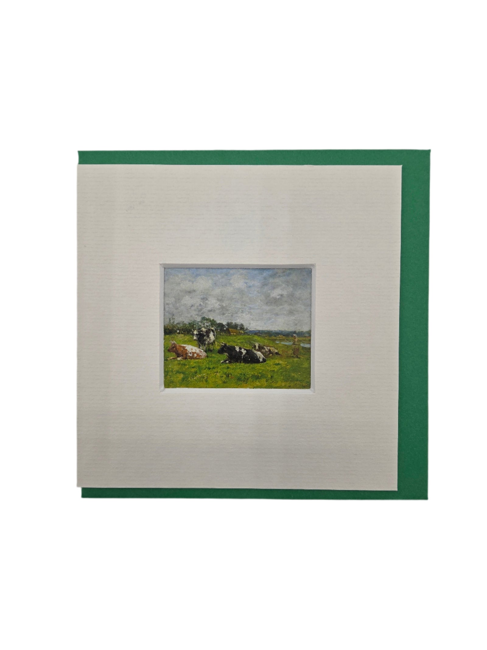 Framed artwork notecard of a landscape with a cows on a grassy bank with a green envelope 