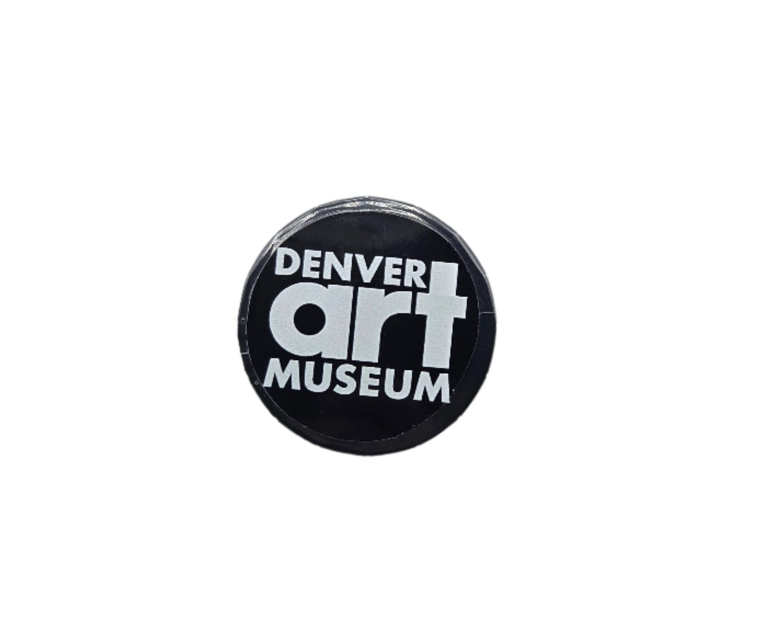 Mint tin with 'Denver Art Museum' logo white text on a black tin