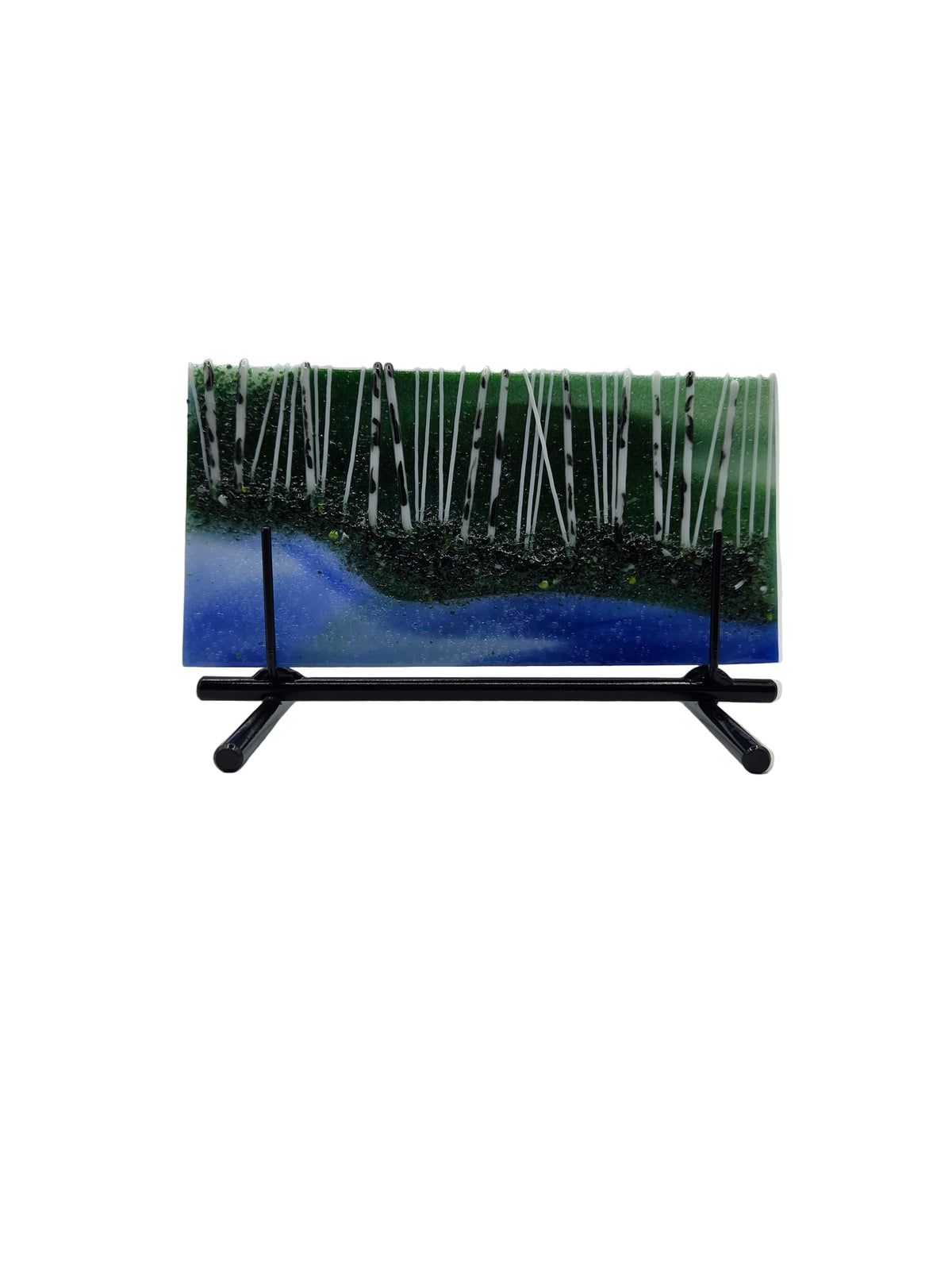 Blue and green fused glass art with black metal stand on a white background