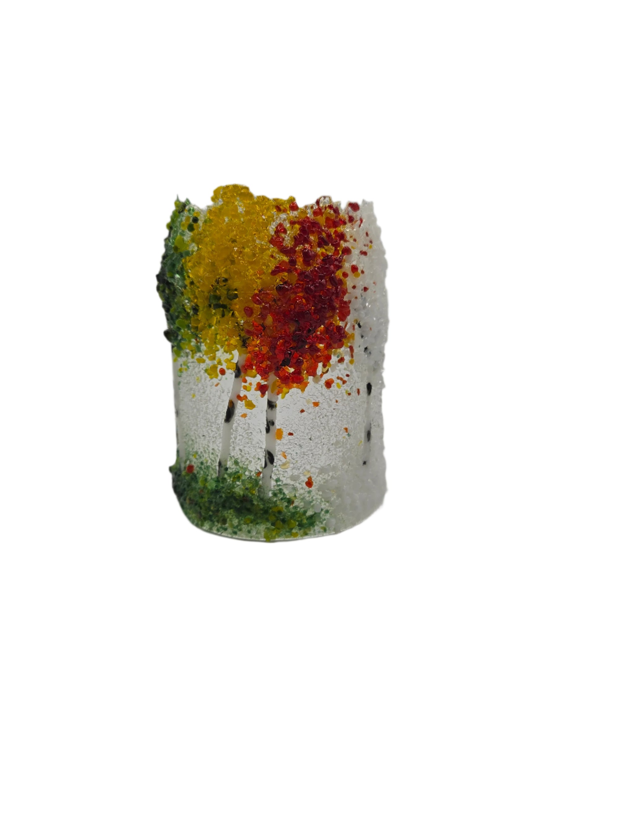 Decorative glass with green, yellow, red and white trees on a white background
