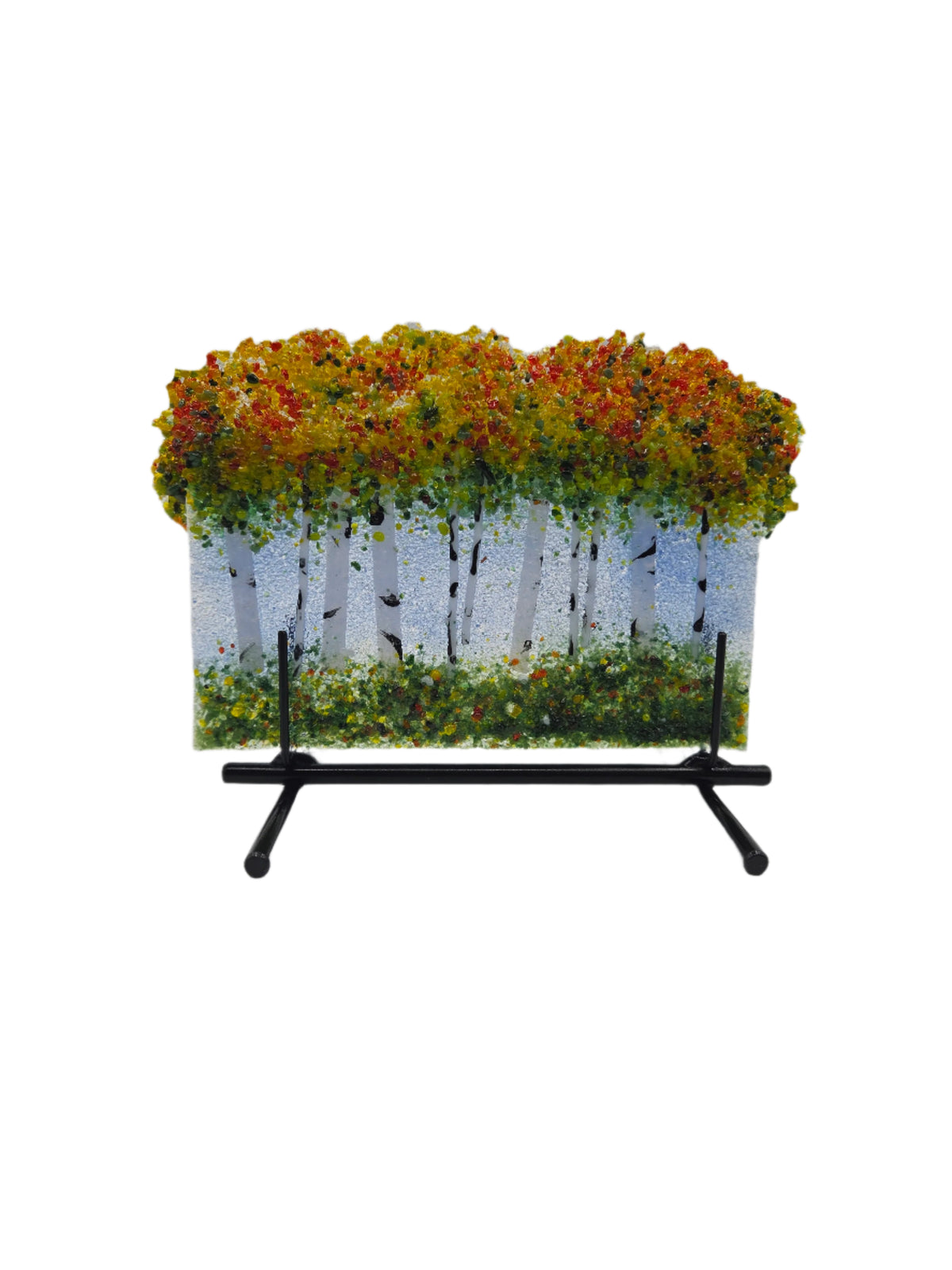 Decorative glass with yellow and green trees on a white background