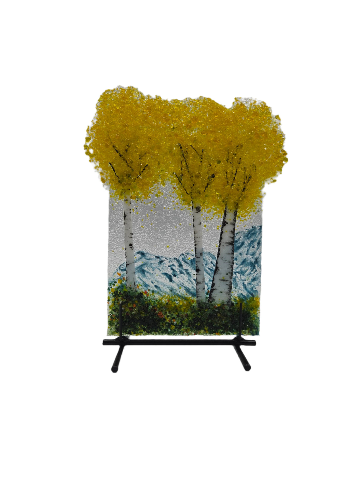 Decorative glass with yellow trees on a white background