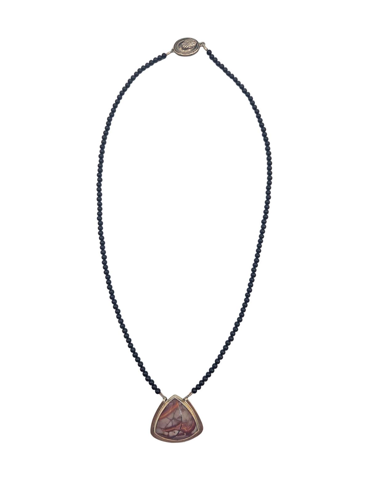 Necklace with a triangular pendant on a light gray background