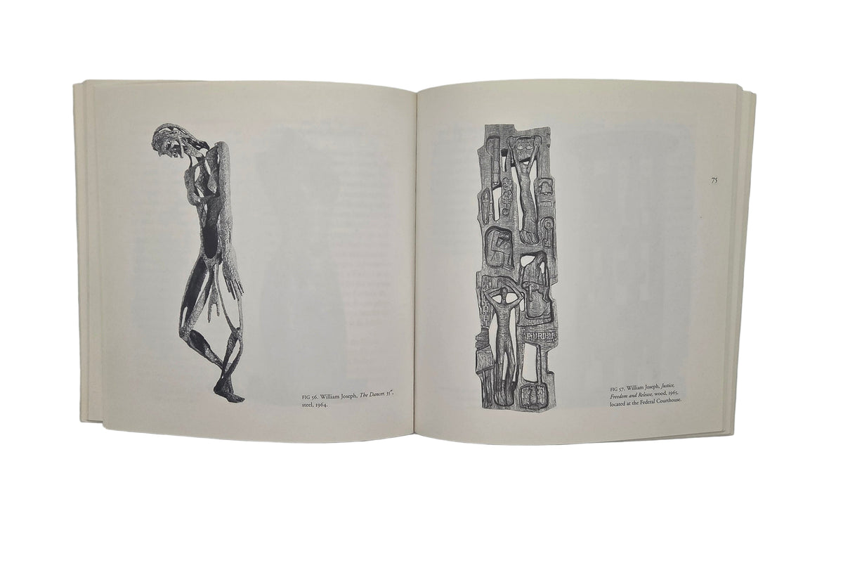 Open book with black and white illustrations 