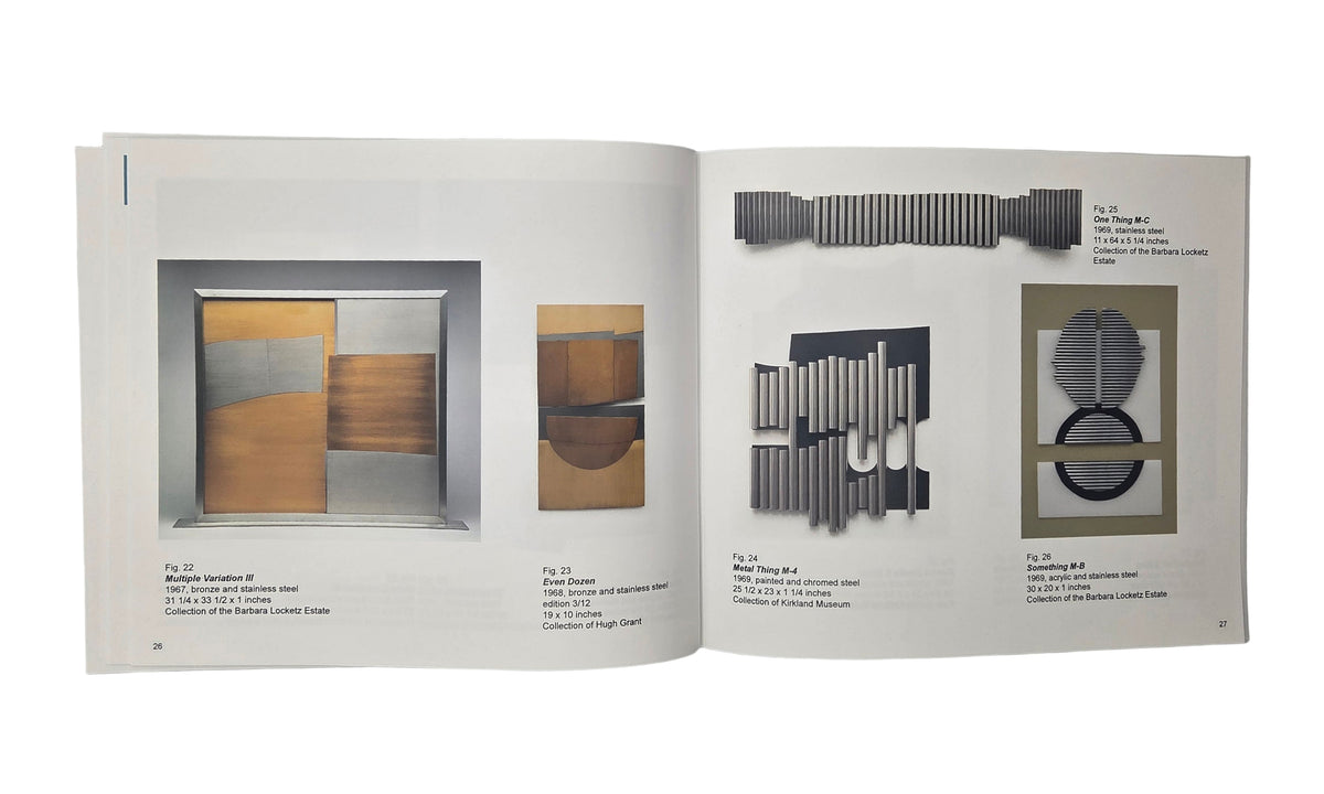 Open book displaying interior design elements on a gray background
