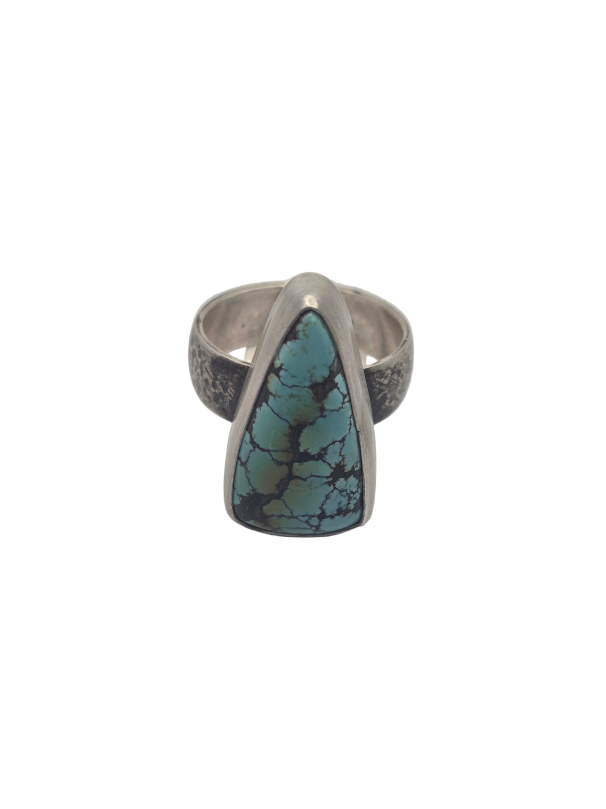 Silver ring with a turquoise stone on a light gray background