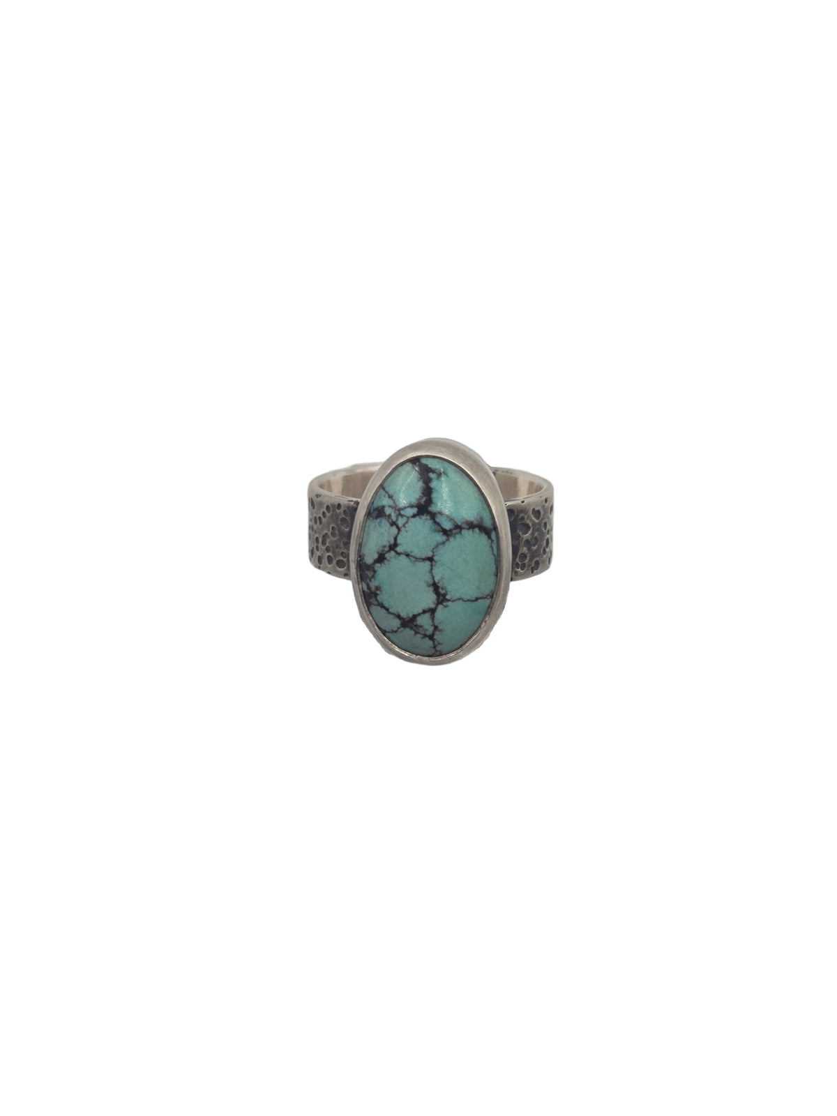 Ring with turquoise stone on a white background