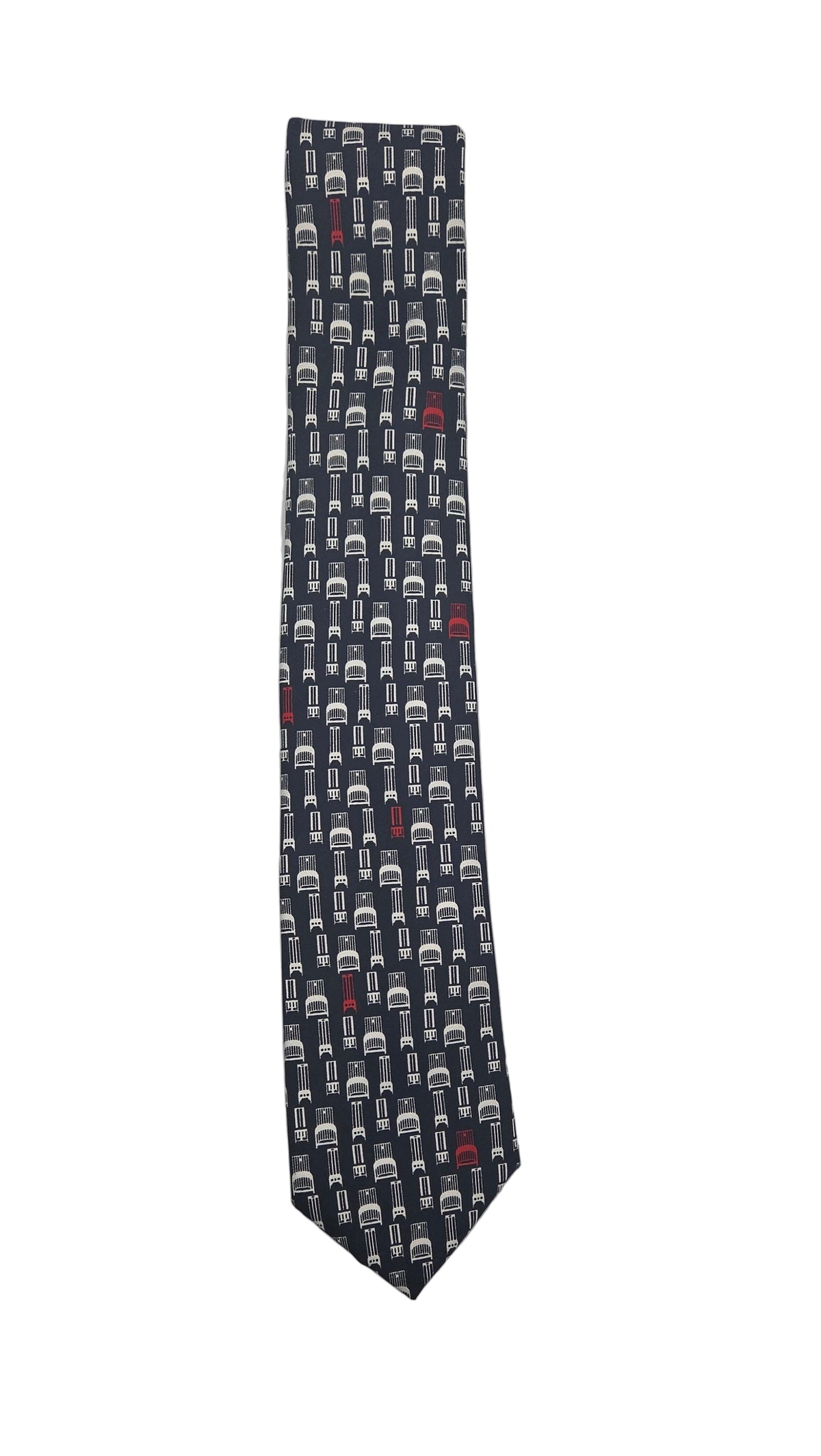 Navy tie with white pattern on a light gray background