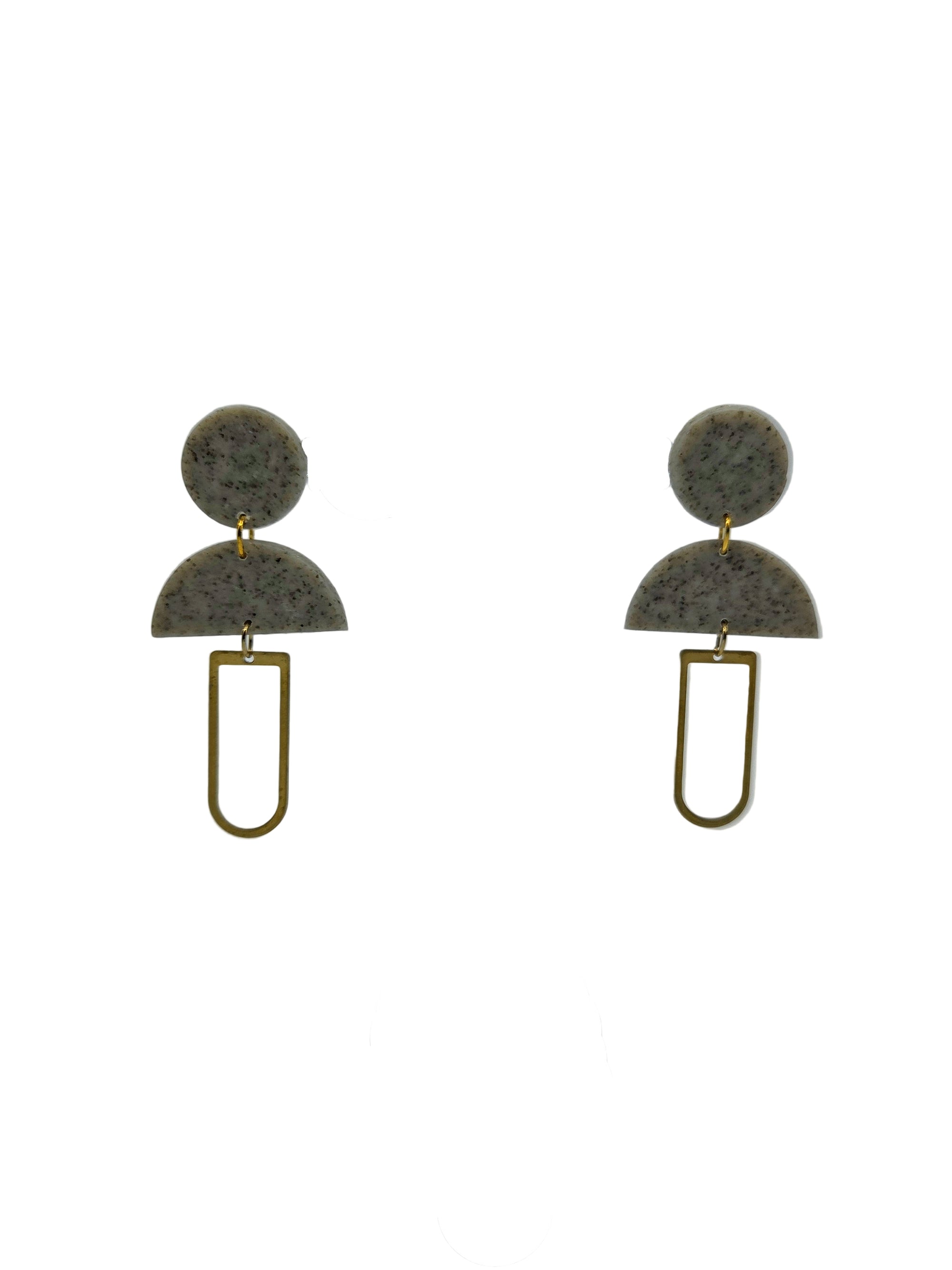 pair of grey circle with a hanging half circle clay earrings