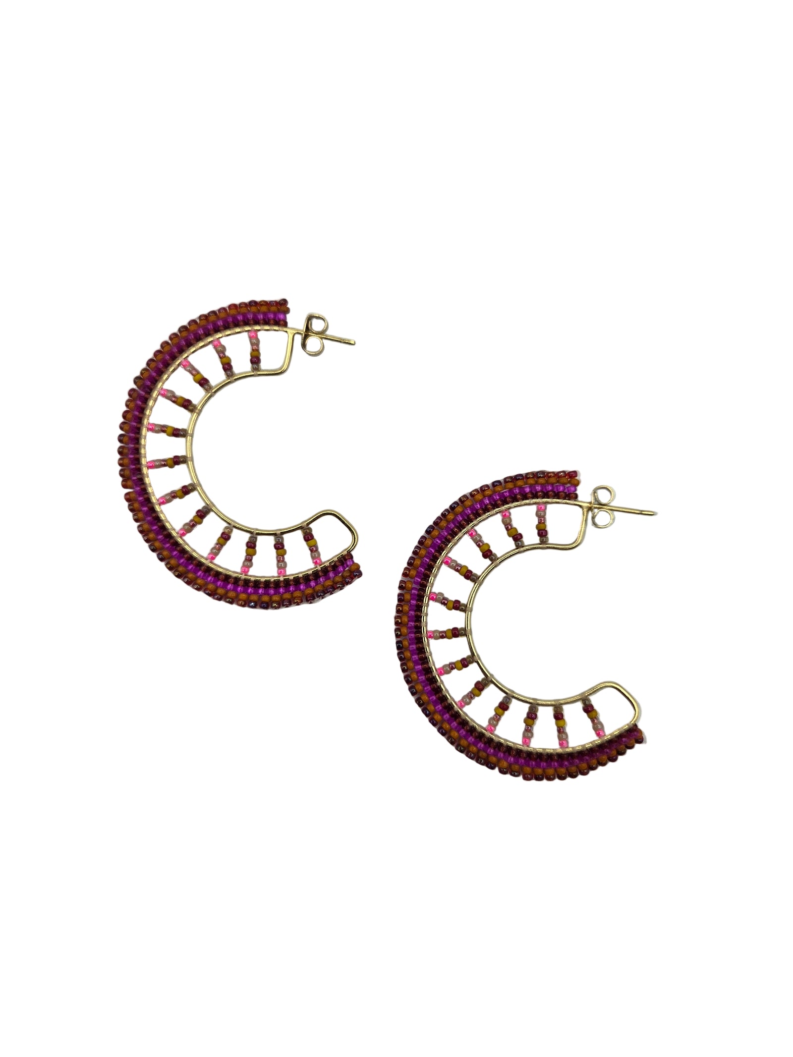 Pair of gold and purple beaded earrings on a white background