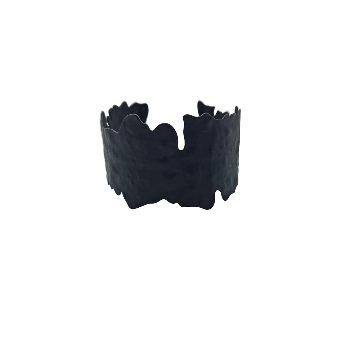Black textured bracelet on a white background