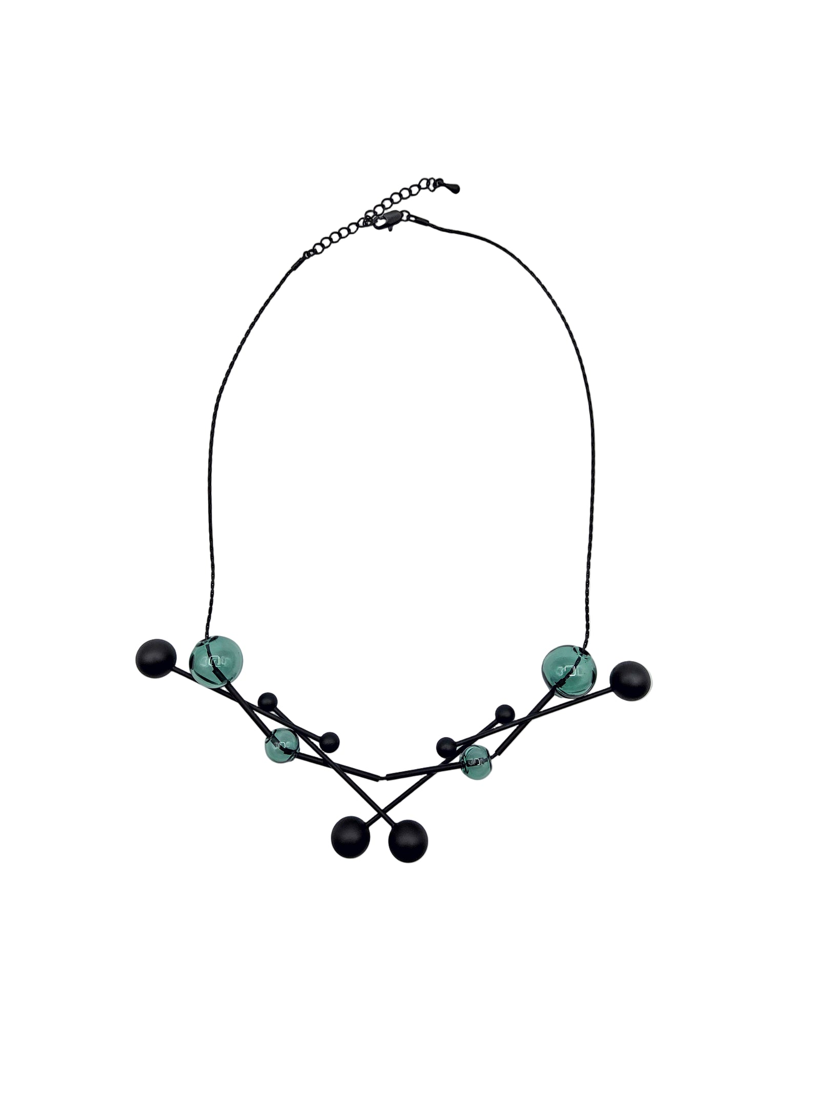 Necklace with green and black beads on a white background