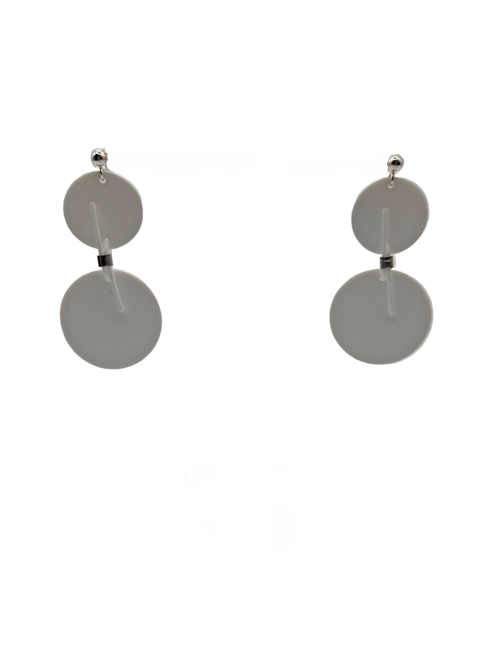 White circular earrings