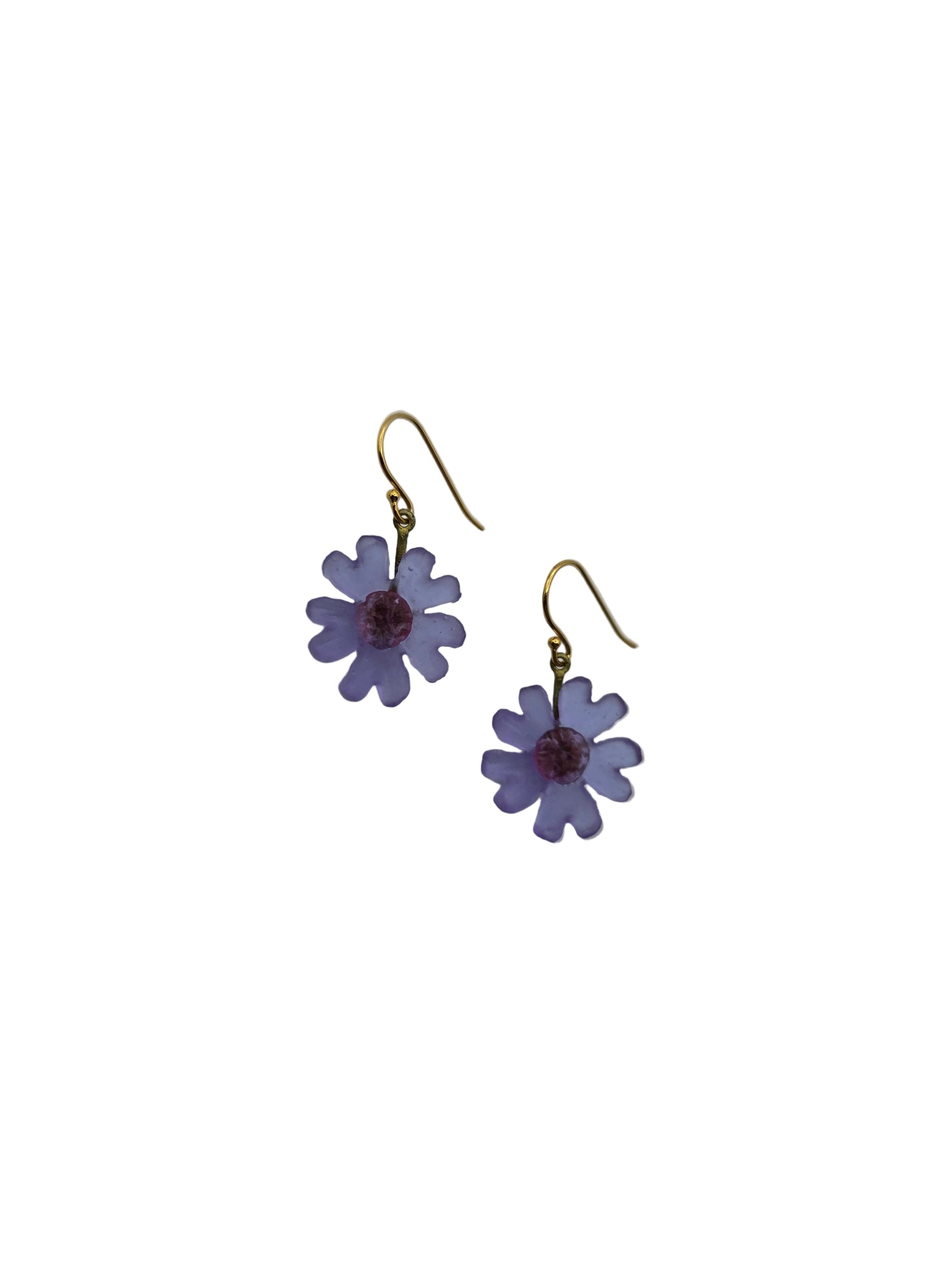 Purple flower-shaped earrings on a white background