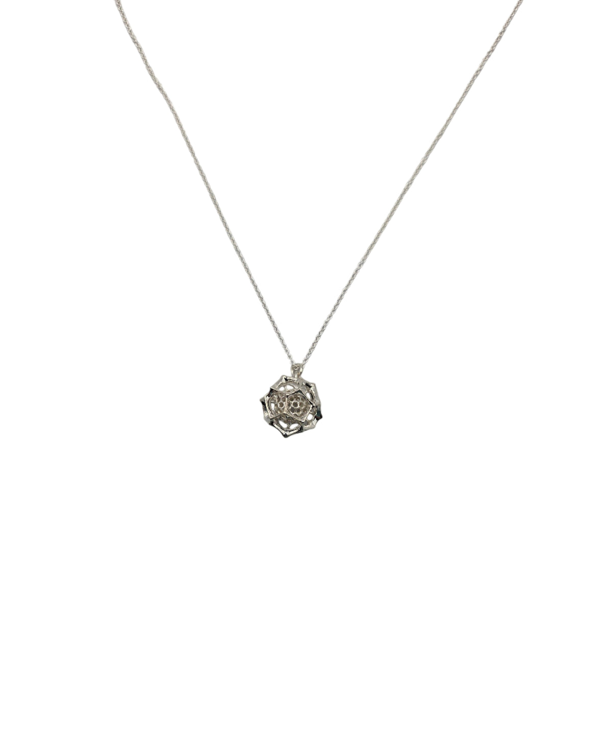 Silver necklace with a pendant on a white background