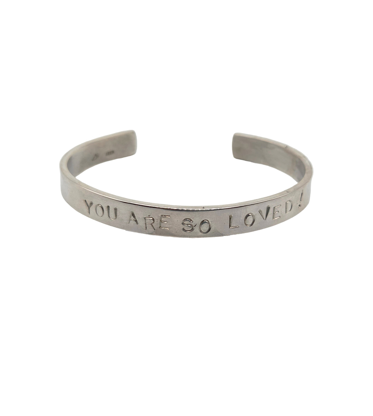 Silver bracelet with &#39;YOU ARE SO LOVED&#39; engraving on a white background