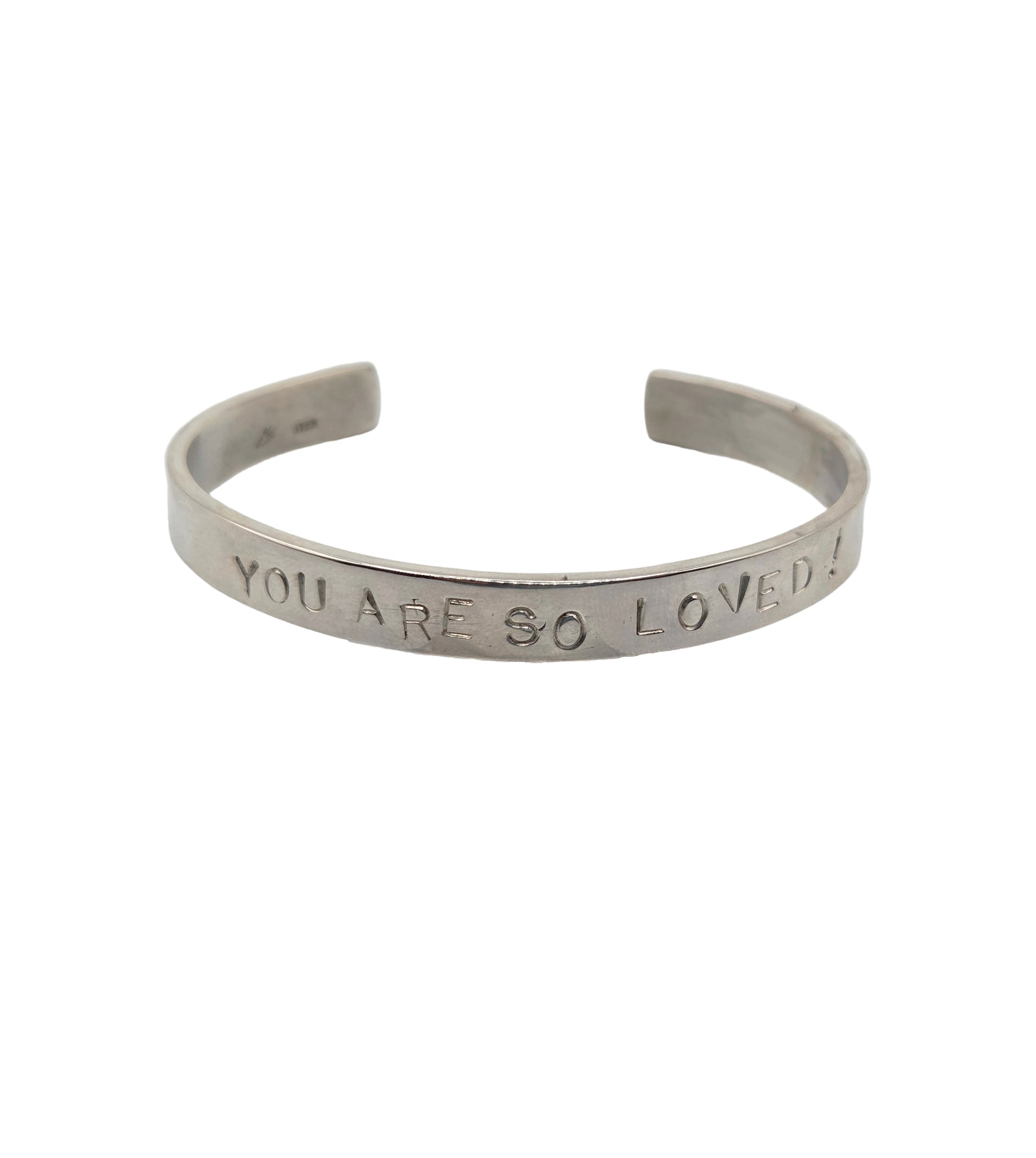 Silver bracelet with 'YOU ARE SO LOVED' engraving on a white background