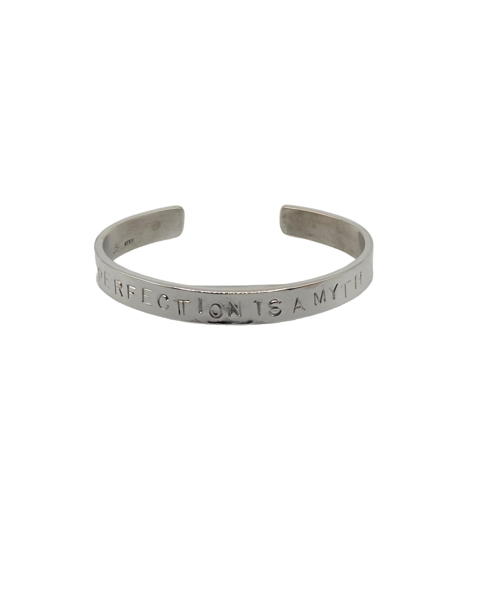 Silver bracelet with engraved text on a white background