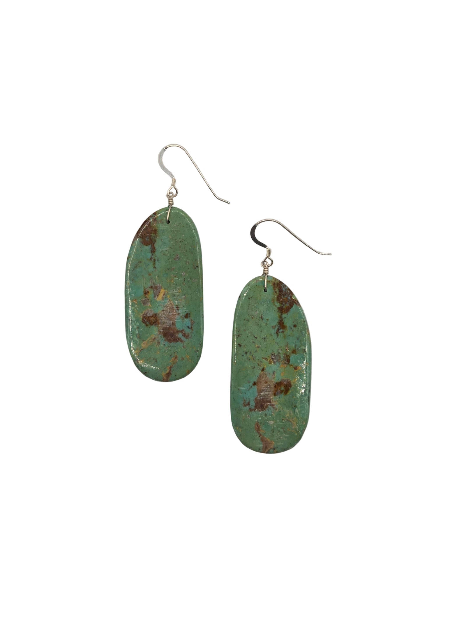 Pair of green oval earrings with brown speckles on a white background