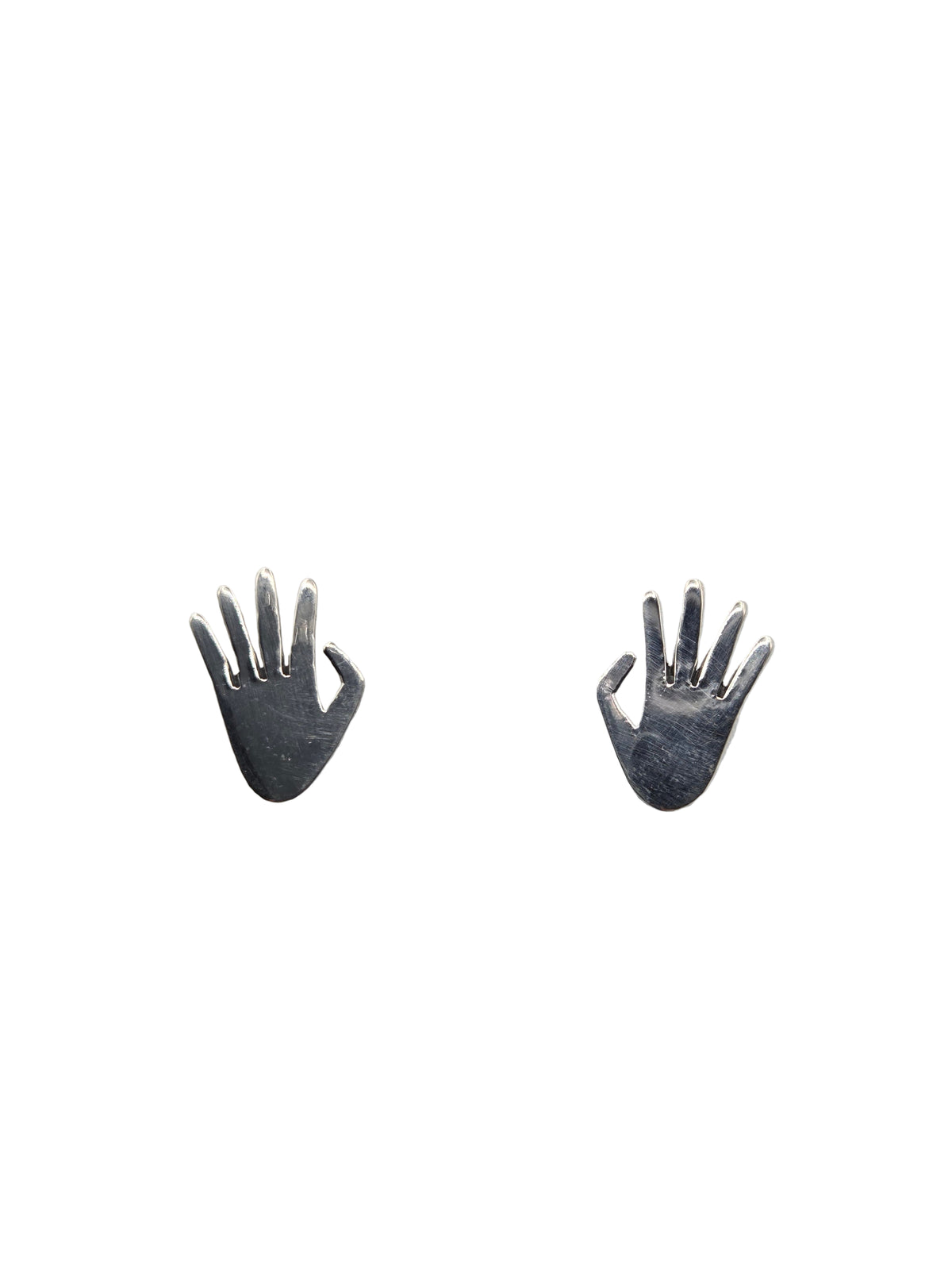Two small silver hand-shaped earrings