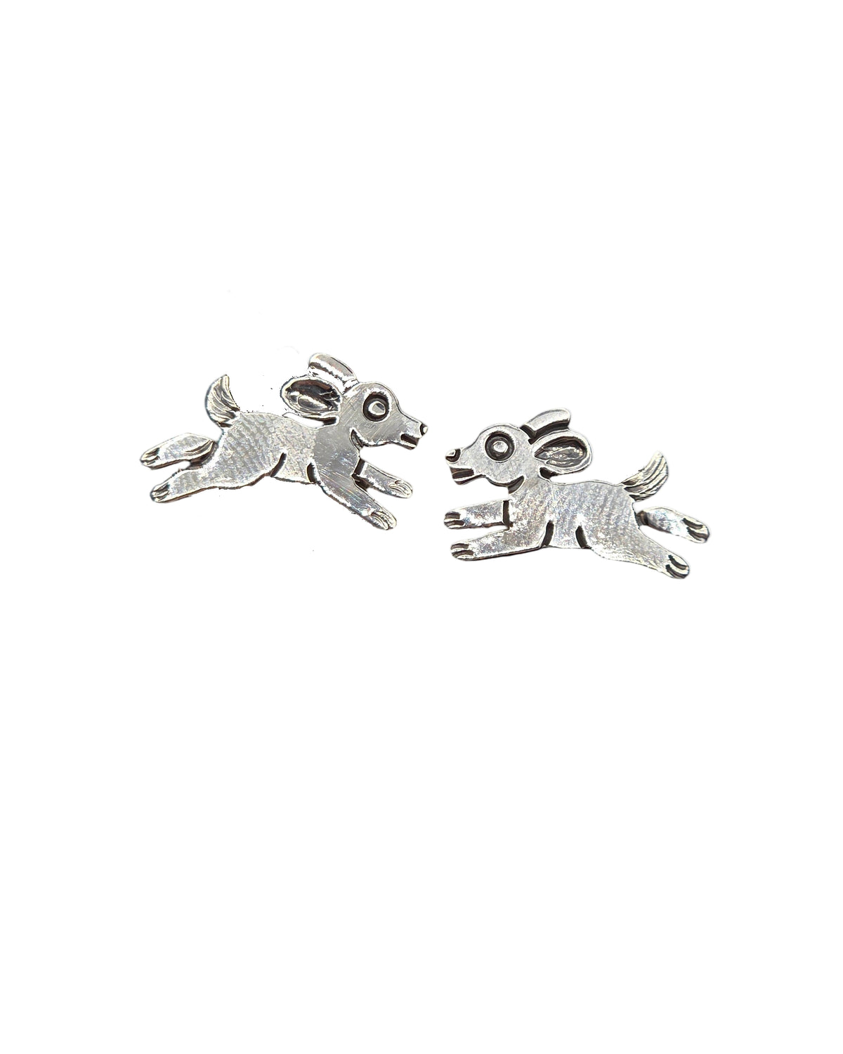 Pair of silver rabbit-shaped earrings on a white background