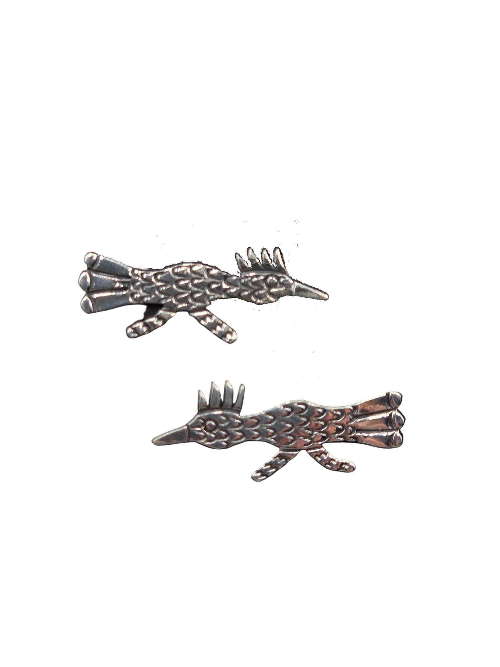 Pair of silver road runner-shaped earrings on a white background
