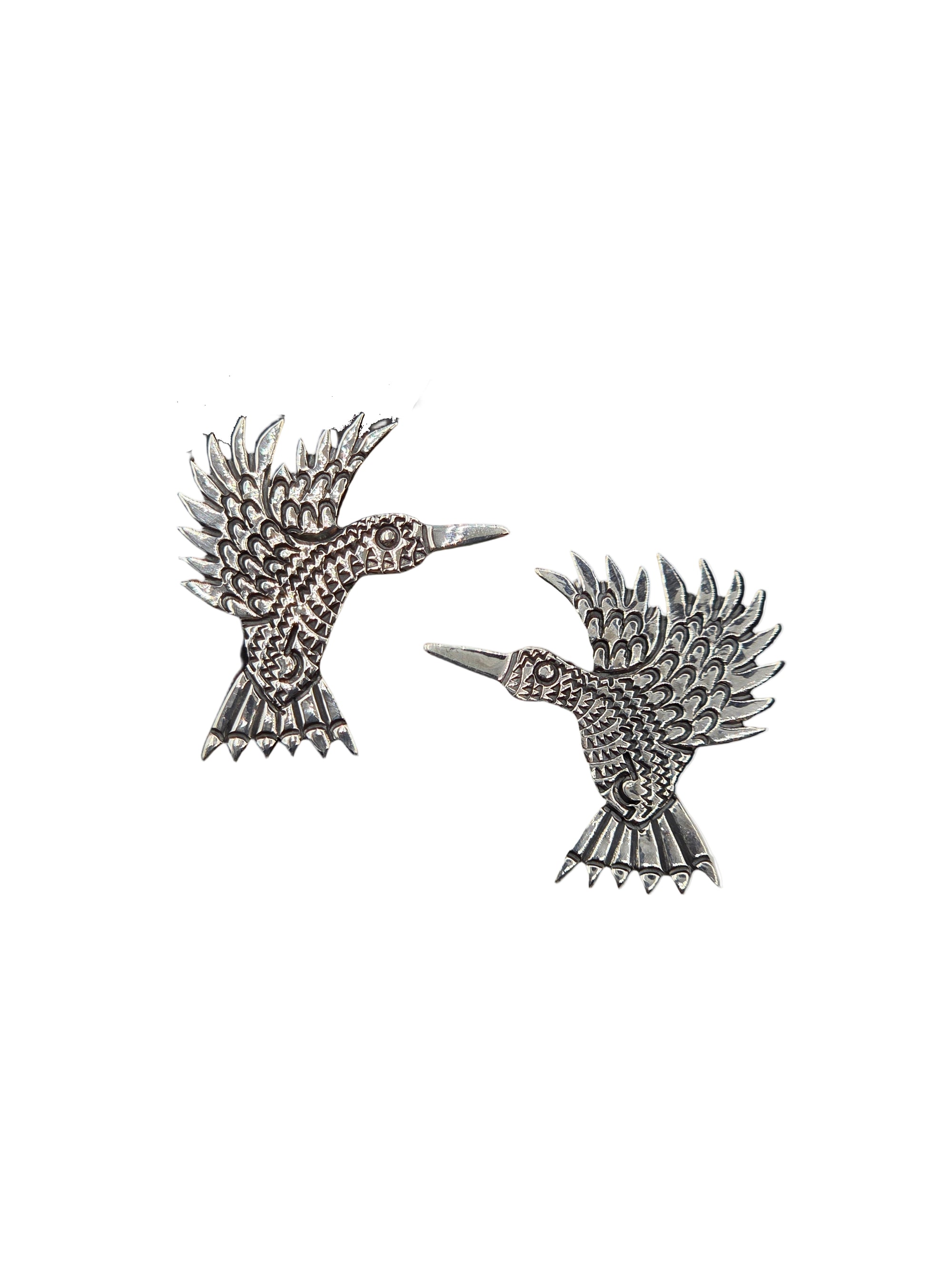 Pair of silver bird earrings on a white background