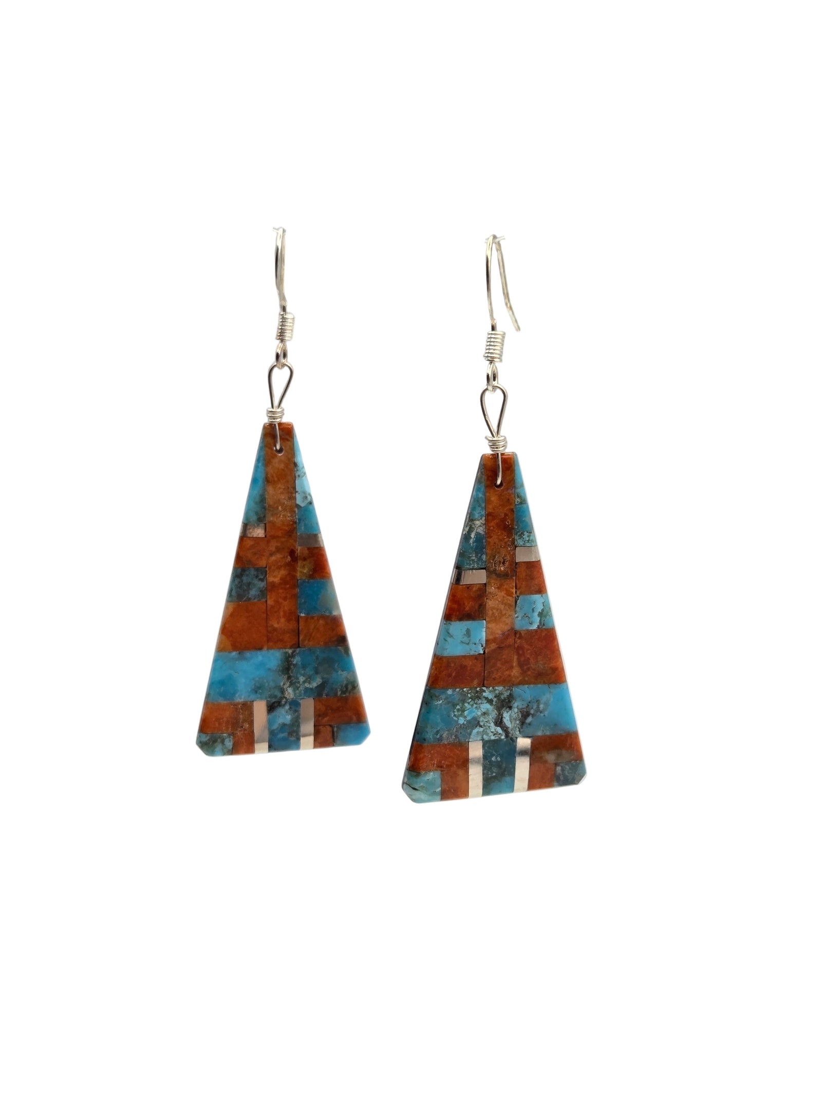 Triangular earrings with a geometric pattern on a white background