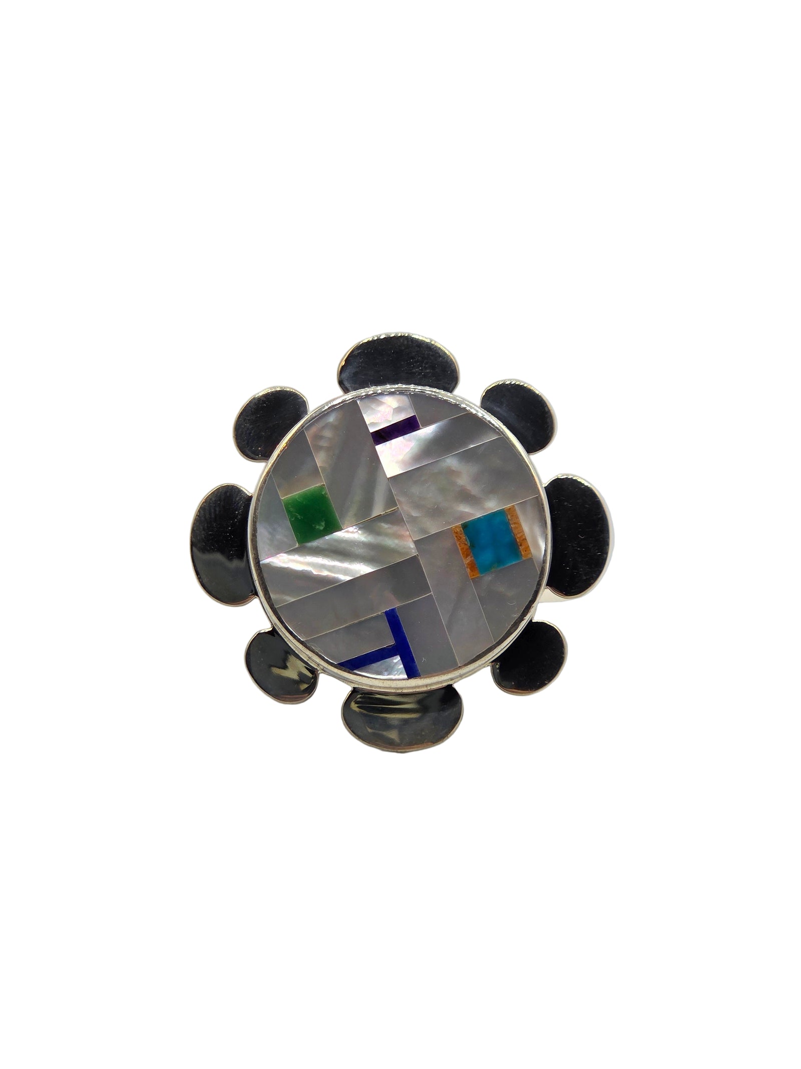 Decorative ring with a central circular design on a white background