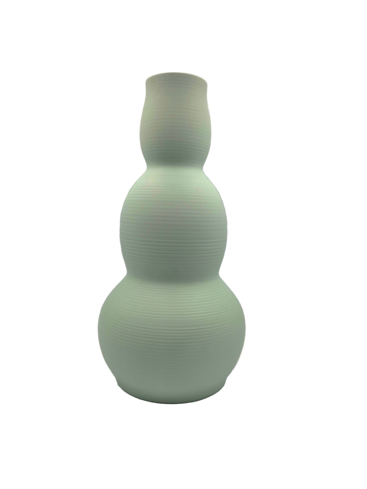 Green textured vase on a white background