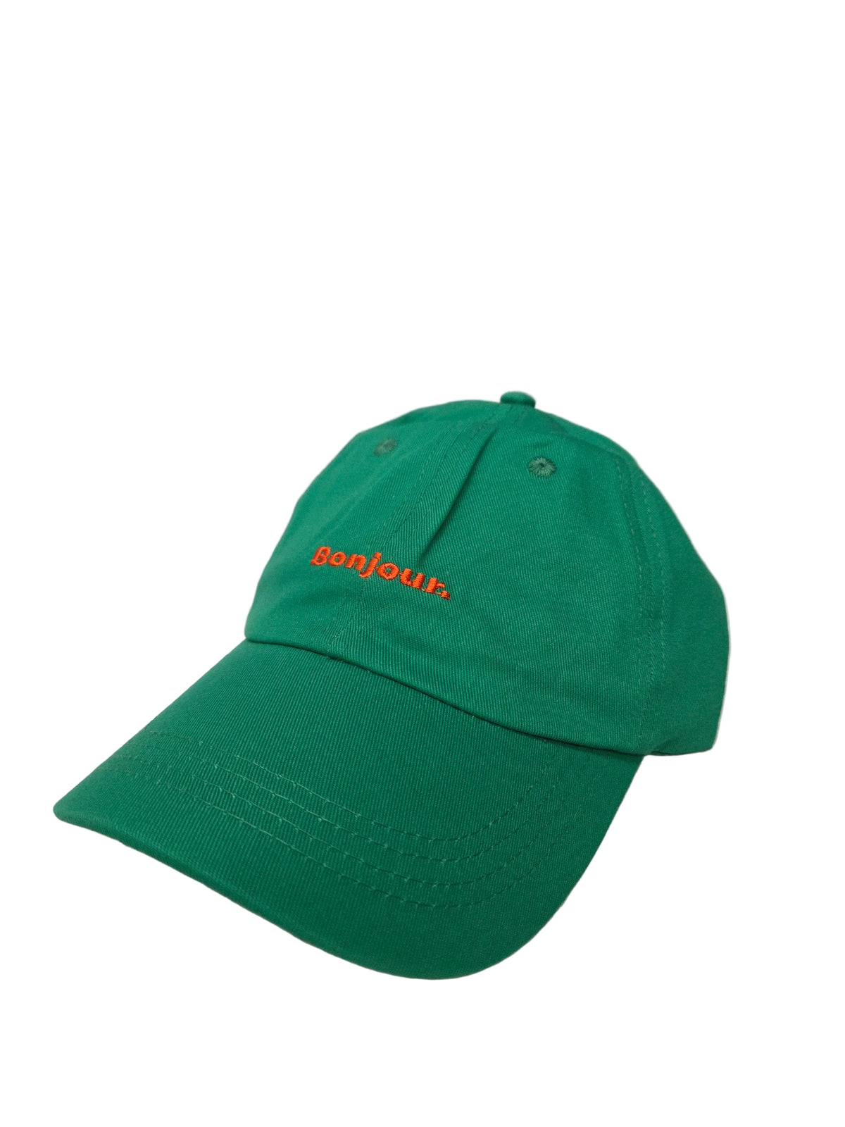 Green cap with orange text on a gray background
