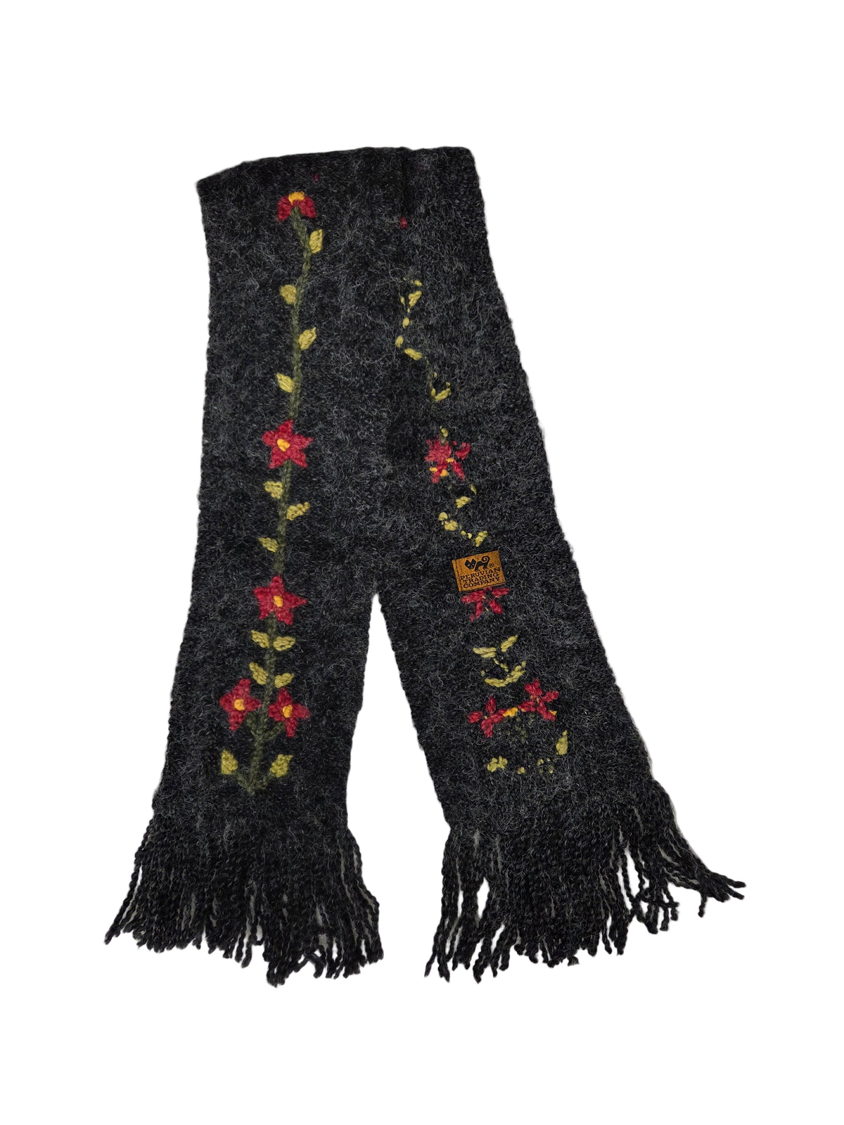 Black embroidered scarf with floral patterns on a white surface