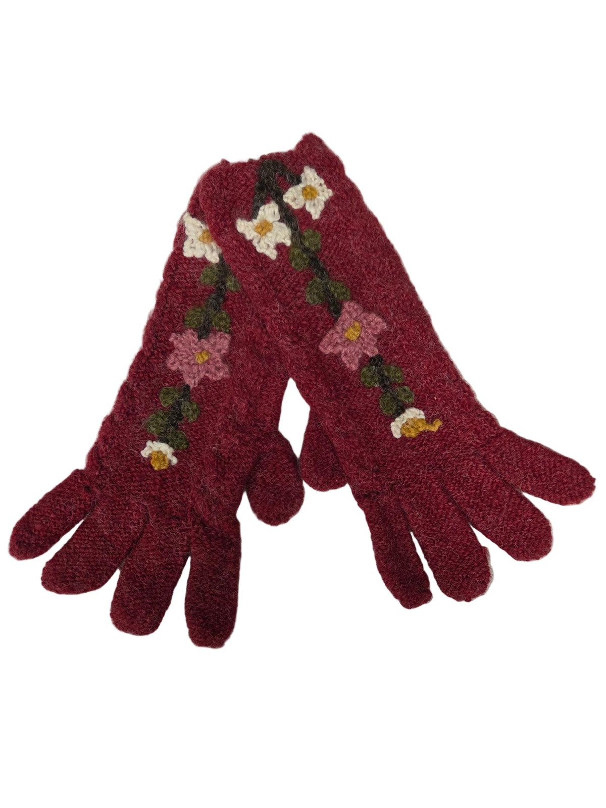 Red gloves with floral patterns on a white surface