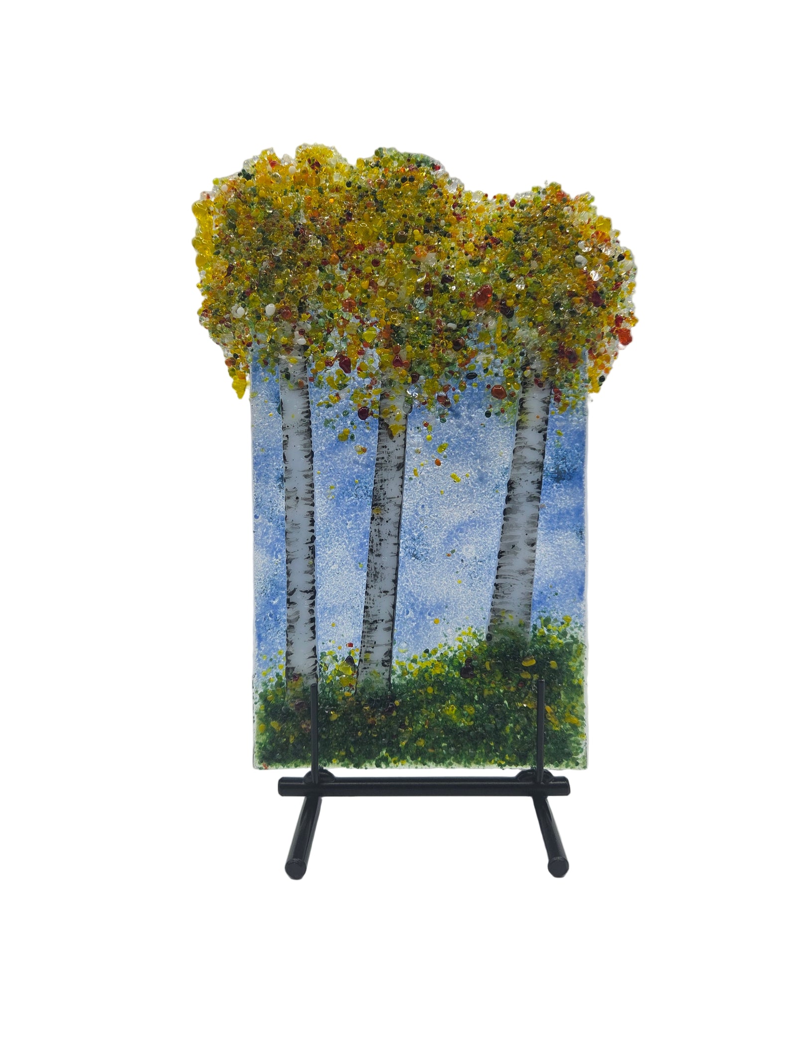 Decorative glass panel with yellow and green trees on a white background