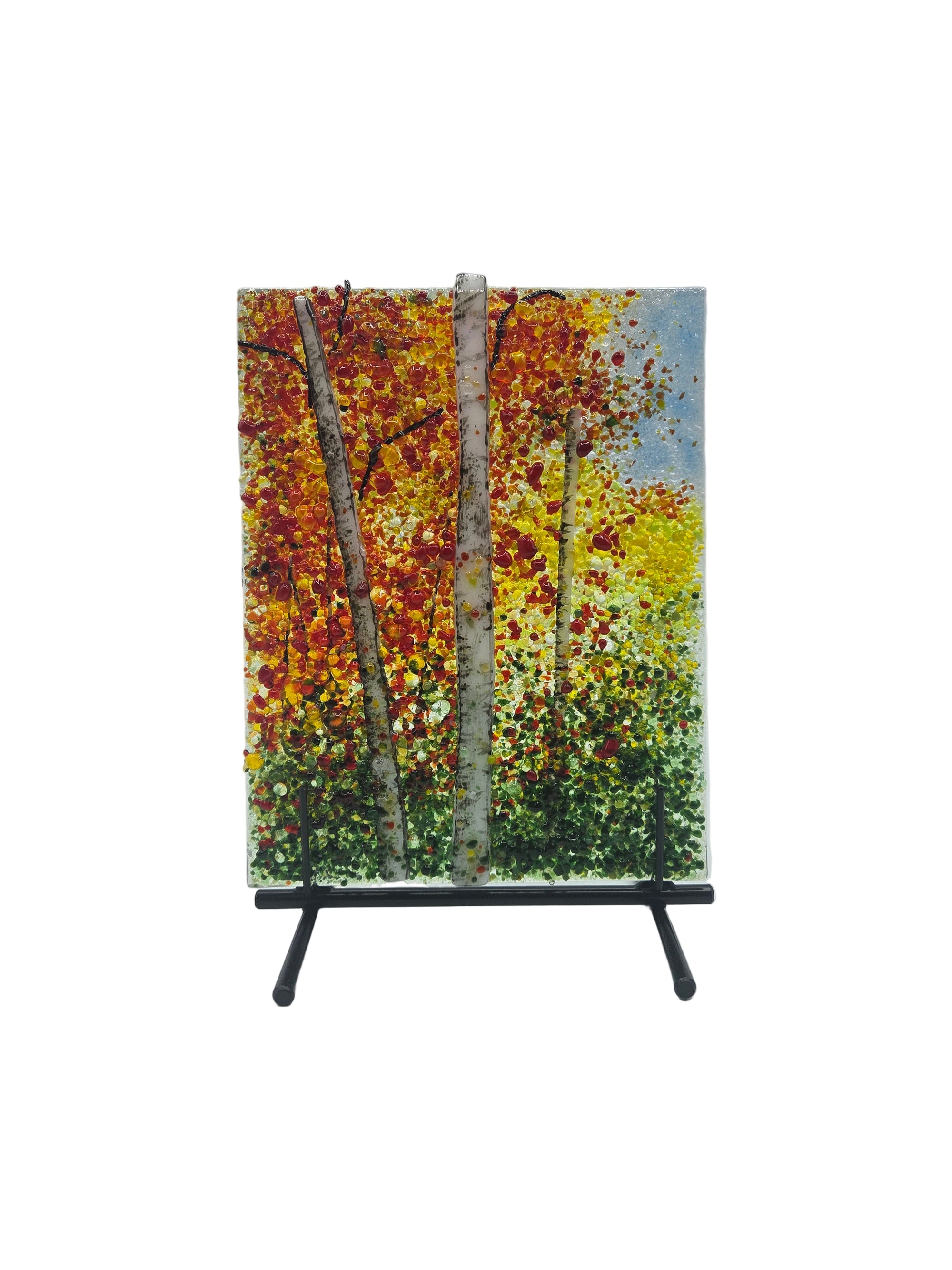 Decorative glass panel with red and yellow trees on a white background