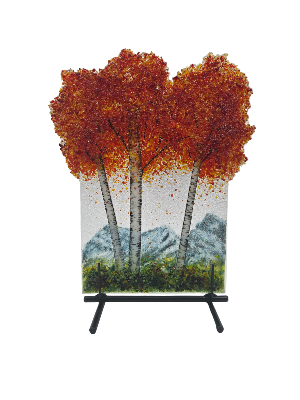 Decorative glass panel with red trees on a white background