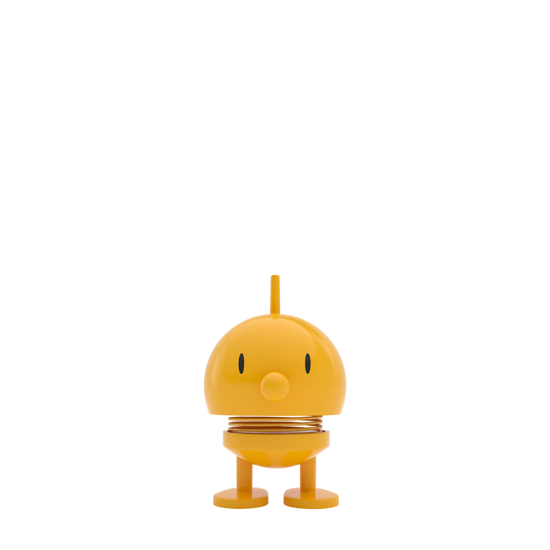Yellow spring-like toy figure on a white background
