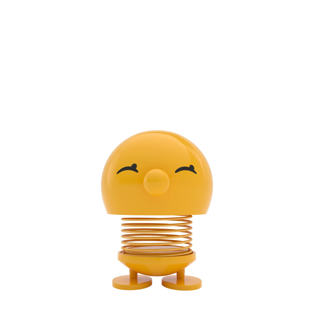Yellow spring toy with a face on a white background