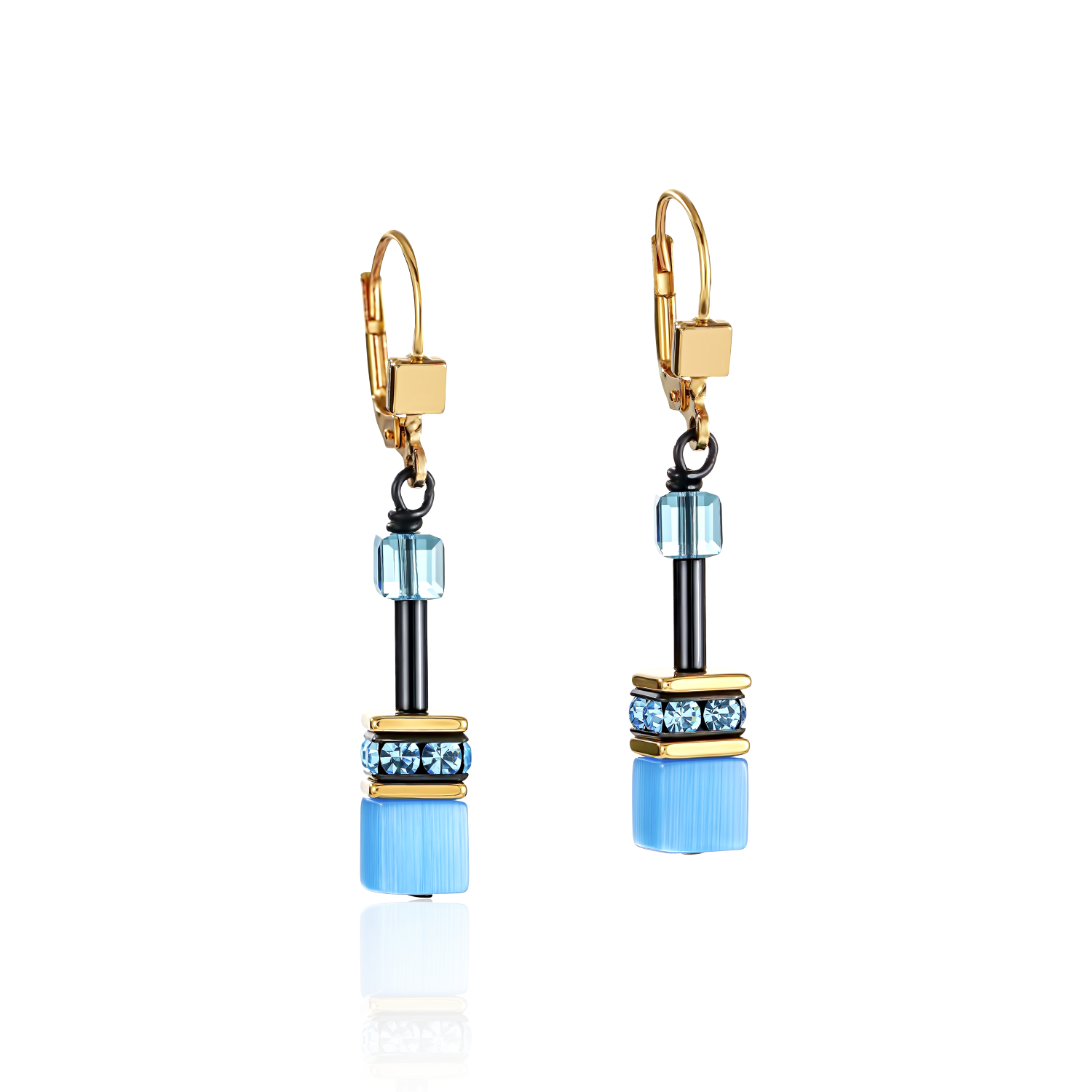 Pair of earrings with blue and gold accents on a white background