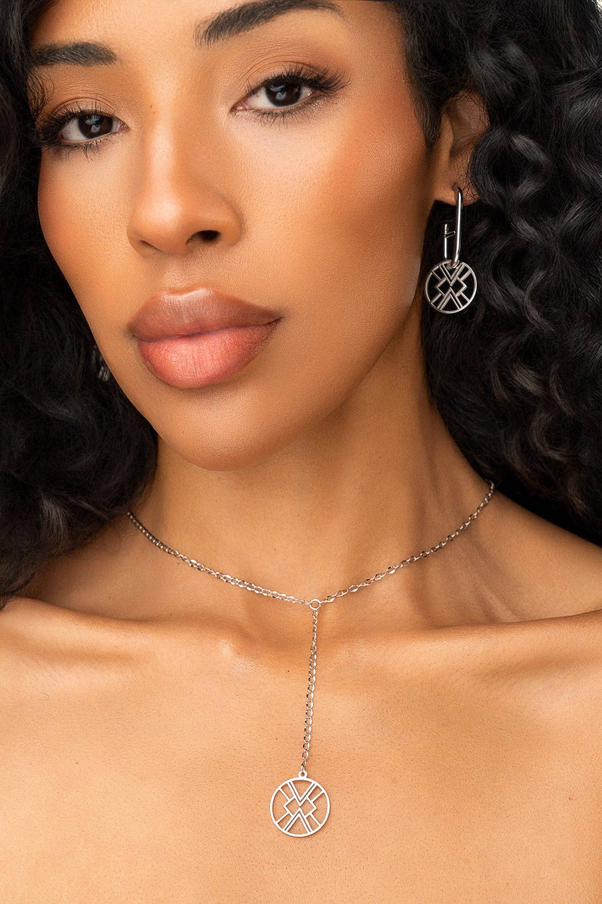 Emblem Huggie Hoop Earring - Silver
